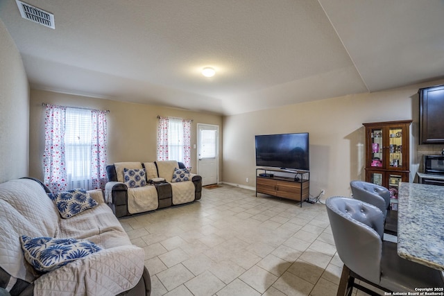 15403 Cooks Petrel, San Antonio, TX 78253 - living room with baseboards and light tile patterned floors