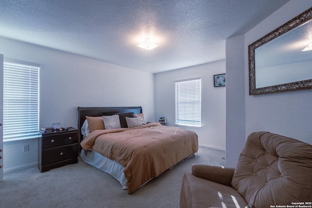 5634 Forest Cyn, San Antonio, TX 78252 - bedroom featuring carpet floors, a textured ceiling, and baseboards