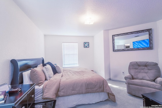 5634 Forest Cyn, San Antonio, TX 78252 - carpeted bedroom with a textured ceiling and baseboards