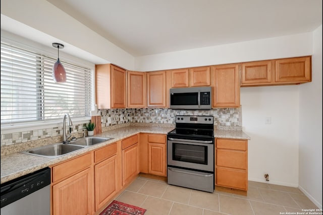 540 Marilyn Dr, Schertz, TX 78154 - kitchen with appliances with stainless steel finishes, tasteful backsplash, a sink, light tile patterned floors, and light countertops