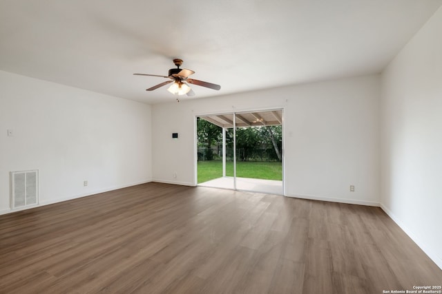 540 Marilyn Dr, Schertz, TX 78154 - unfurnished room featuring ceiling fan, wood finished floors, and baseboards