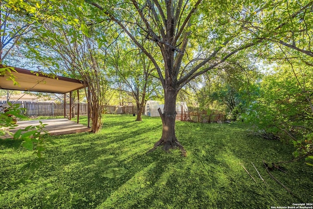 11415 Rousseau St, San Antonio, TX 78251 - view of yard featuring a patio area