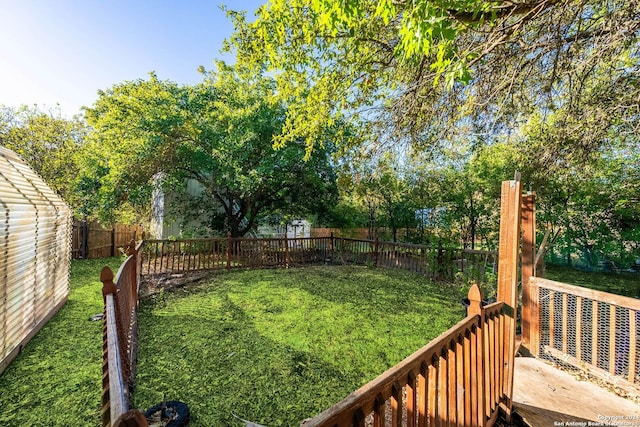 11415 Rousseau St, San Antonio, TX 78251 - view of yard with a wooden deck