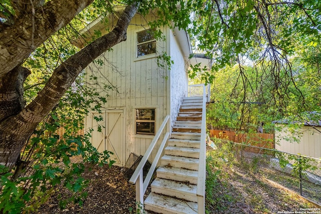 11415 Rousseau St, San Antonio, TX 78251 - view of side of home with stairs