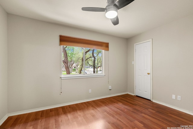 122 Kettle Cv, Universal City, TX 78148 - spare room featuring wood finished floors, baseboards, and a ceiling fan