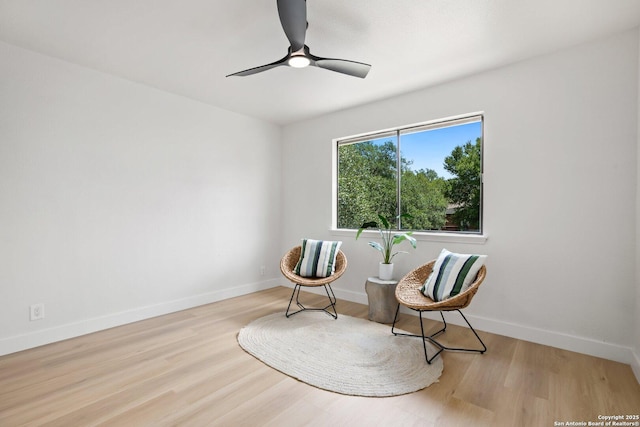 959 Lightstone Dr, San Antonio, TX 78258 - living area with wood finished floors, ceiling fan, and baseboards