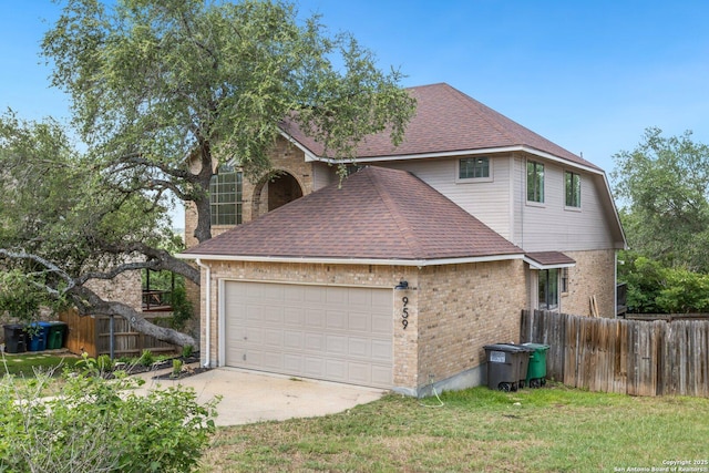 959 Lightstone Dr, San Antonio, TX 78258 - view of home's exterior featuring brick siding, an attached garage, concrete driveway, and a shingled roof