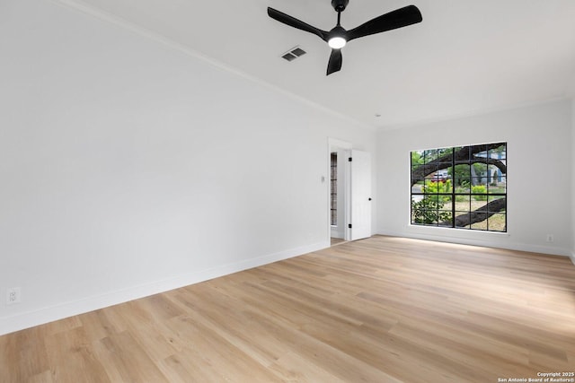 959 Lightstone Dr, San Antonio, TX 78258 - unfurnished room featuring crown molding, light wood finished floors, baseboards, and a ceiling fan