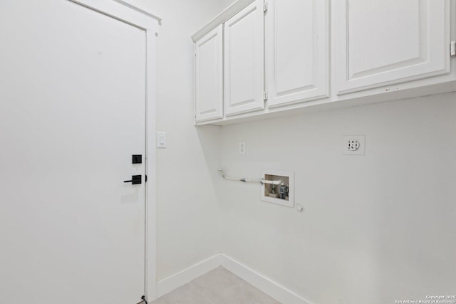959 Lightstone Dr, San Antonio, TX 78258 - laundry room featuring cabinet space, washer hookup, baseboards, electric dryer hookup, and hookup for a gas dryer