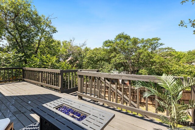 959 Lightstone Dr, San Antonio, TX 78258 - wooden deck with a fire pit
