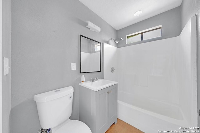 139 Wichita Ct, San Antonio, TX 78225 - full bathroom featuring vanity, toilet, shower / bathtub combination, and wood finished floors