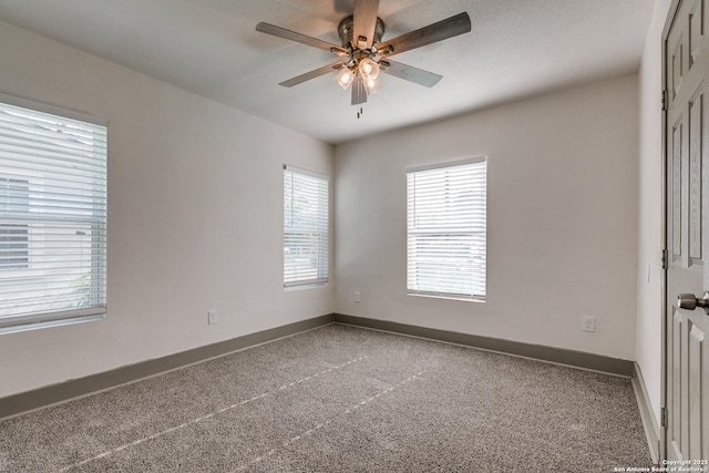 2822 Spokane, San Antonio, TX 78222 - empty room with a ceiling fan, carpet flooring, and baseboards