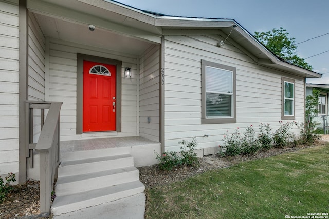 2822 Spokane, San Antonio, TX 78222 - property entrance featuring a security system and a lawn