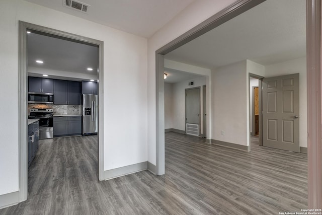 2822 Spokane, San Antonio, TX 78222 - corridor featuring wood finished floors, baseboards, and recessed lighting