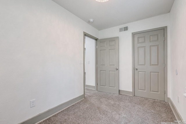 2822 Spokane, San Antonio, TX 78222 - unfurnished bedroom with carpet flooring and baseboards