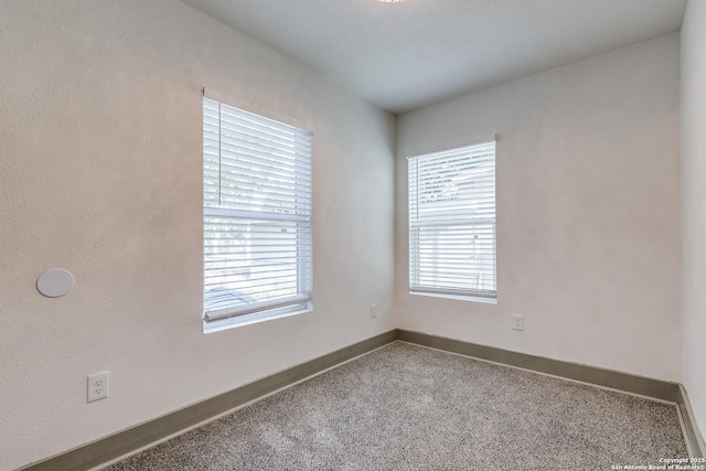 2822 Spokane, San Antonio, TX 78222 - carpeted empty room with baseboards
