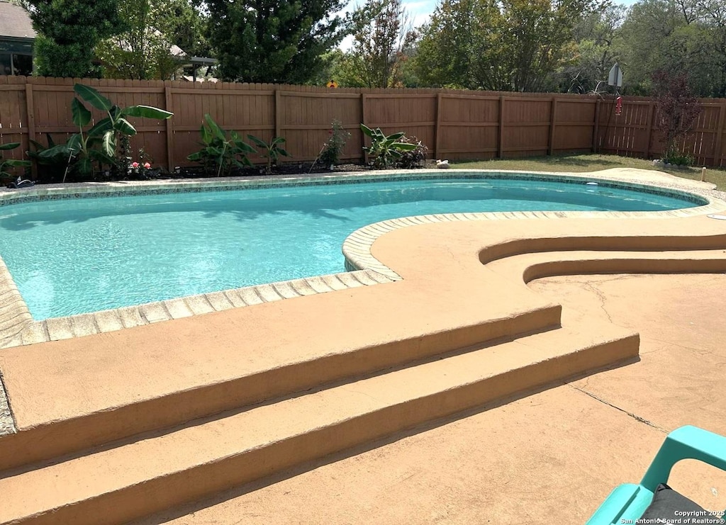 13635 Oak Breeze, Universal City, TX 78148 - view of swimming pool with a fenced backyard