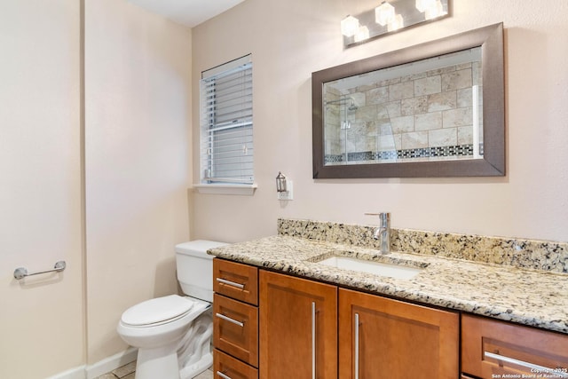 13635 Oak Breeze, Universal City, TX 78148 - bathroom featuring vanity, toilet, a tile shower, and baseboards