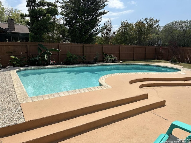 13635 Oak Breeze, Universal City, TX 78148 - view of swimming pool featuring a fenced backyard