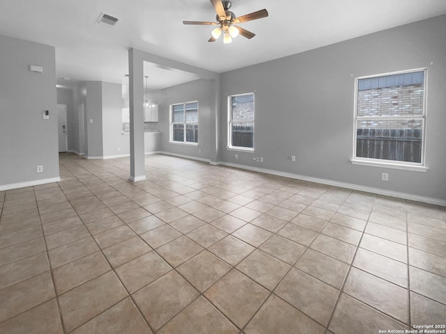 13611 Drakewood, San Antonio, TX 78247 - unfurnished living room featuring tile patterned flooring, ceiling fan, and baseboards