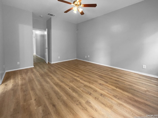 13611 Drakewood, San Antonio, TX 78247 - spare room with a ceiling fan, wood finished floors, and baseboards
