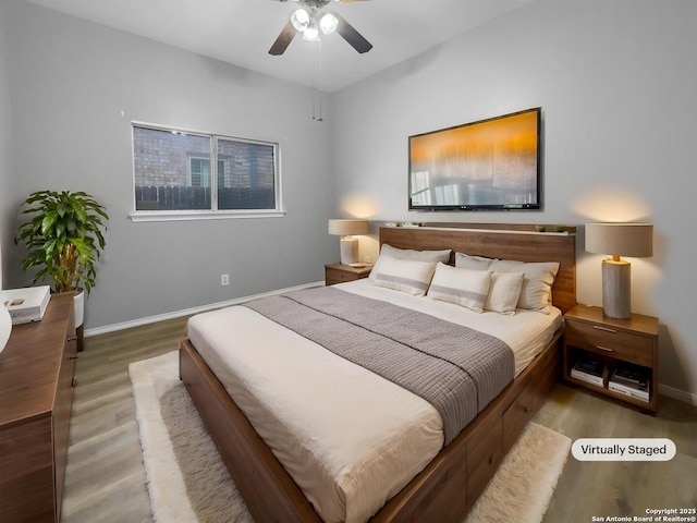 13611 Drakewood, San Antonio, TX 78247 - bedroom with wood finished floors, baseboards, and ceiling fan