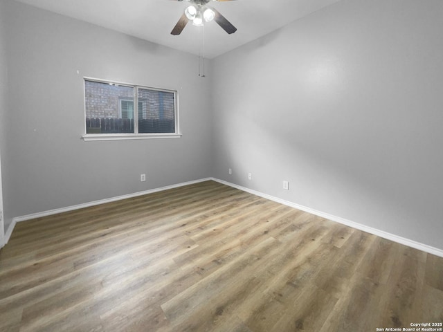 13611 Drakewood, San Antonio, TX 78247 - empty room with baseboards, a ceiling fan, and wood finished floors