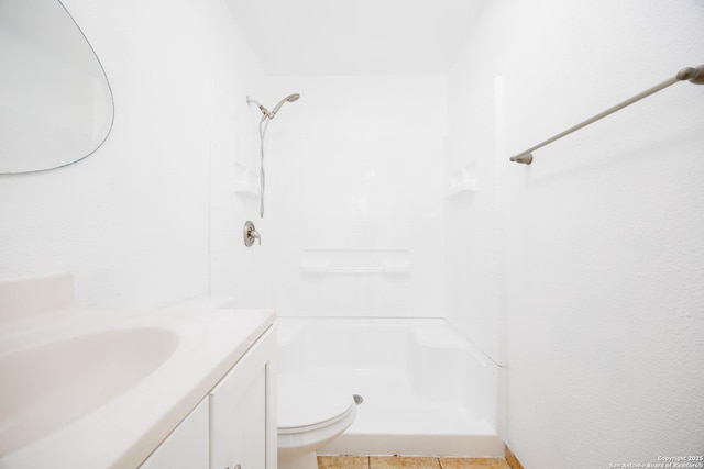 429 Aviation, Universal City, TX 78148 - bathroom with vanity, a shower, toilet, and tile patterned flooring