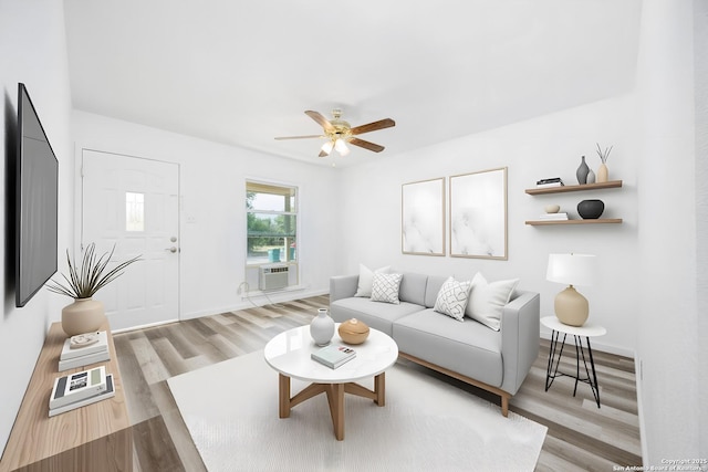 429 Aviation, Universal City, TX 78148 - living area featuring light wood-style floors, ceiling fan, baseboards, and an AC wall unit