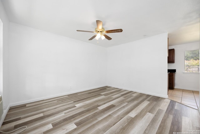 429 Aviation, Universal City, TX 78148 - unfurnished room featuring ceiling fan, light wood-style flooring, and baseboards