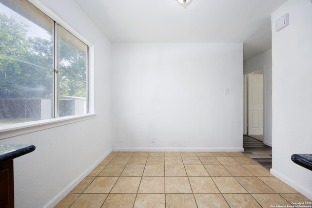 429 Aviation, Universal City, TX 78148 - spare room featuring light tile patterned floors and baseboards