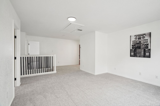 242 Butternut, San Antonio, TX 78245 - spare room with attic access, carpet, and baseboards