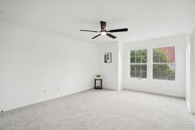 242 Butternut, San Antonio, TX 78245 - unfurnished room featuring light carpet, ceiling fan, and baseboards