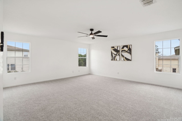 242 Butternut, San Antonio, TX 78245 - carpeted empty room with ceiling fan and baseboards