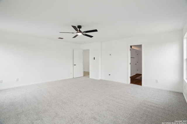 242 Butternut, San Antonio, TX 78245 - unfurnished bedroom featuring carpet, baseboards, and a ceiling fan