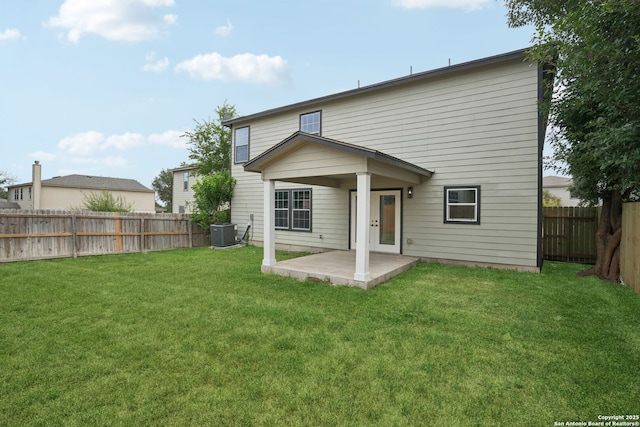 242 Butternut, San Antonio, TX 78245 - back of property featuring central AC and a patio area