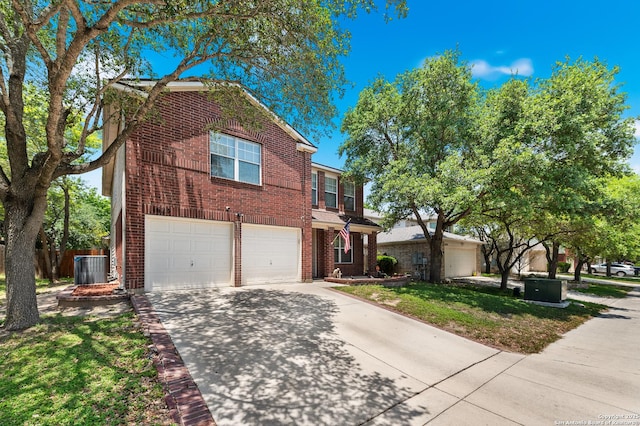 1623 Rainy Brk, Schertz, TX 78154 - traditional-style house with brick siding, driveway, an attached garage, and cooling unit