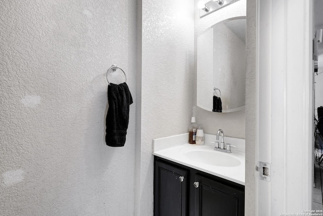 1515 Agency, San Antonio, TX 78245 - bathroom with a textured wall and vanity