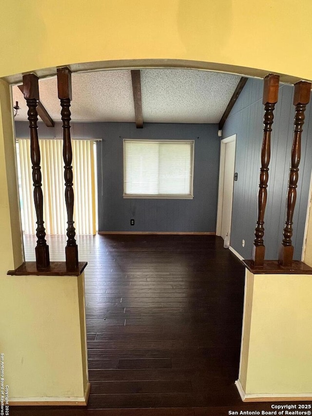 6014 White Cloud, San Antonio, TX 78238 - spare room featuring hardwood / wood-style floors, beamed ceiling, and a textured ceiling