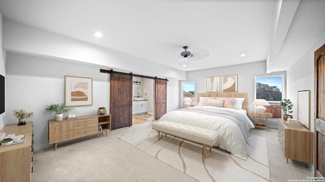 201 Lakeview Cir, La Vernia, TX 78121 - bedroom featuring a barn door, multiple windows, light carpet, and recessed lighting