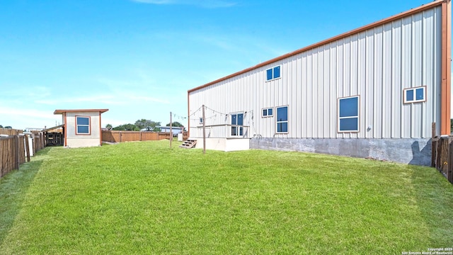 201 Lakeview Cir, La Vernia, TX 78121 - back of house featuring board and batten siding