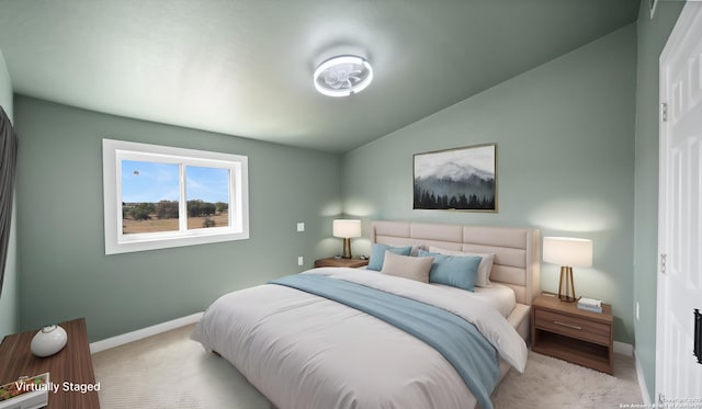 201 Lakeview Cir, La Vernia, TX 78121 - bedroom with light colored carpet, lofted ceiling, and baseboards