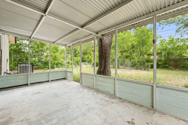 259 Future, San Antonio, TX 78213 - unfurnished sunroom featuring view of scattered trees