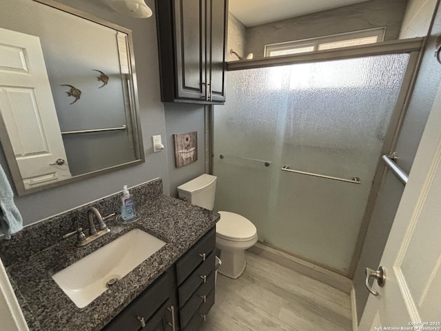 527 Artemis, San Antonio, TX 78218 - full bath featuring vanity, a shower stall, and toilet