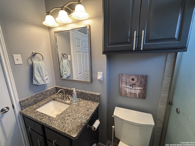 527 Artemis, San Antonio, TX 78218 - bathroom with toilet and vanity