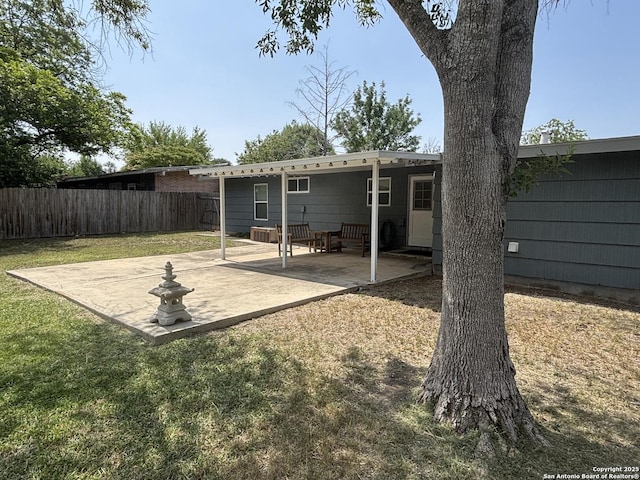 527 Artemis, San Antonio, TX 78218 - rear view of house featuring a patio