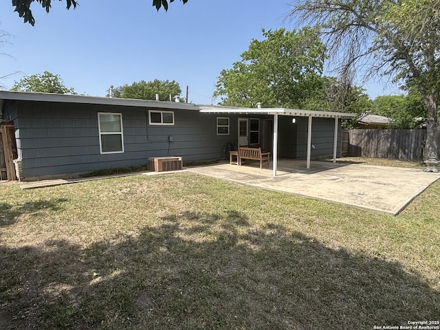 527 Artemis, San Antonio, TX 78218 - back of property featuring a patio and central AC unit