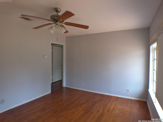 427 Olney, San Antonio, TX 78209 - empty room featuring wood finished floors, ceiling fan, and baseboards