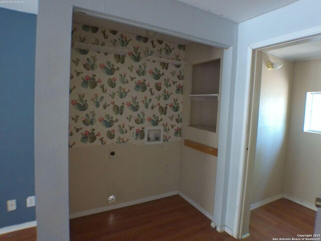 427 Olney, San Antonio, TX 78209 - unfurnished bedroom with wood finished floors and baseboards