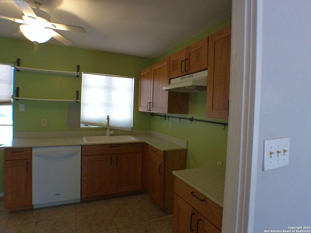 427 Olney, San Antonio, TX 78209 - kitchen featuring dishwasher, under cabinet range hood, a sink, open shelves, and brown cabinets